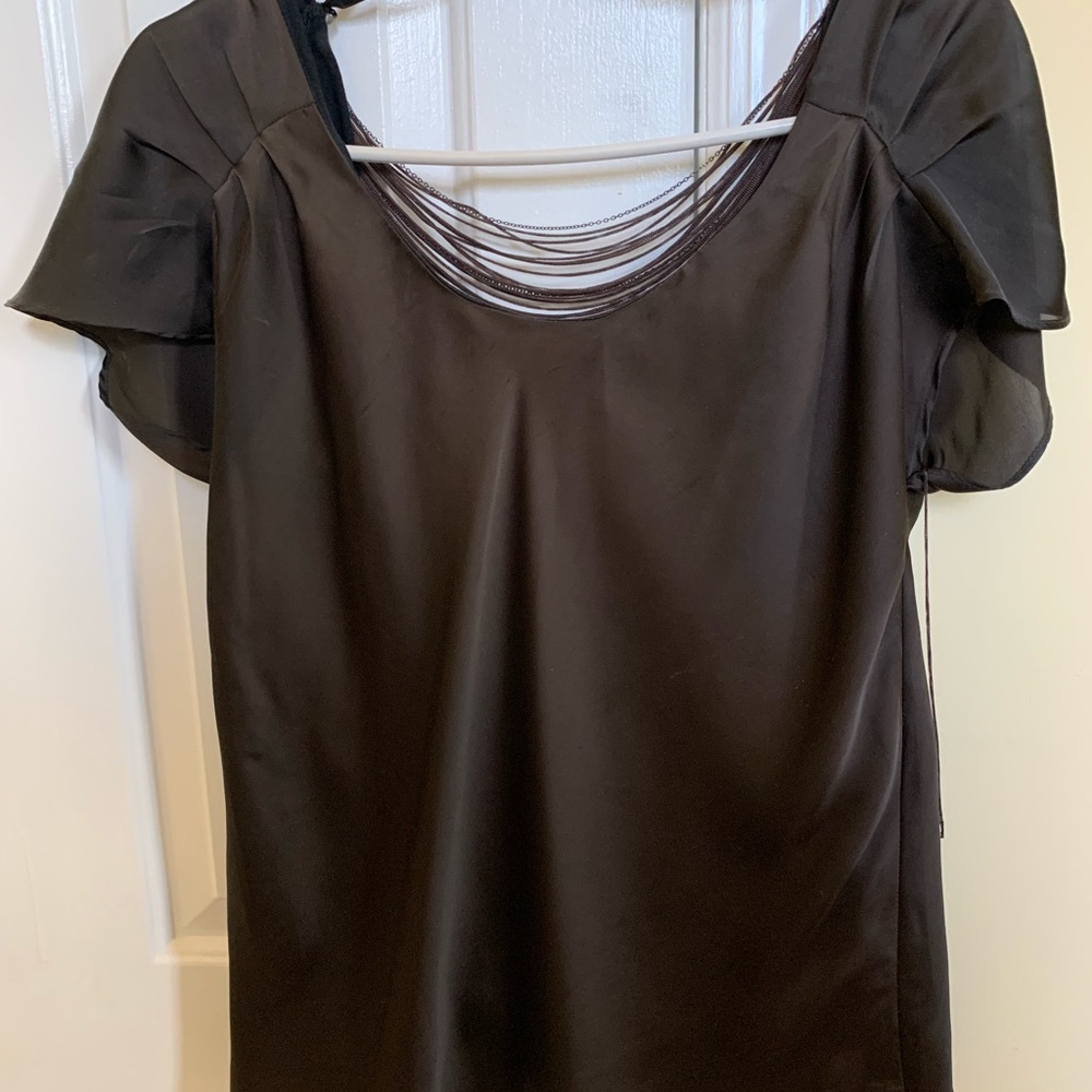95% raylon and spandex. Dry clean only.